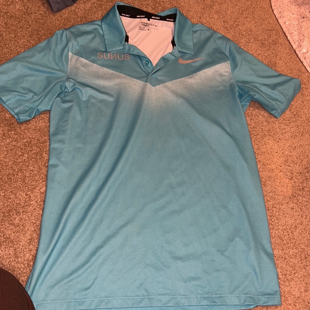 Blue Nike golf shirt